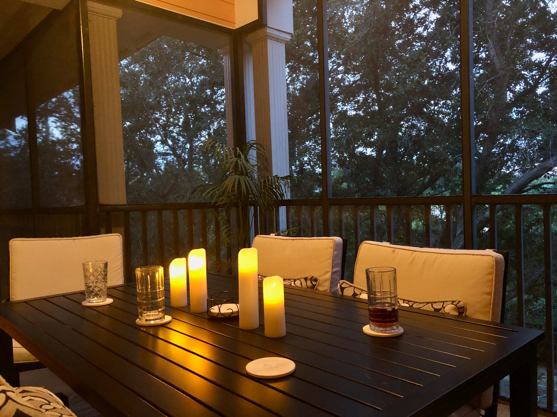 Balcony at dusk with candlelit dining