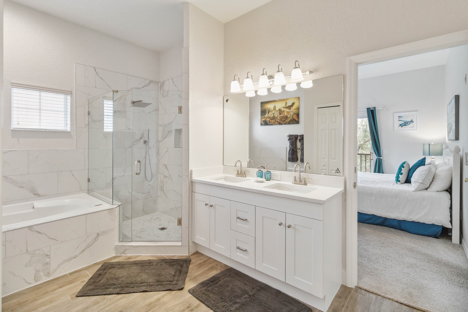 Family bathroom with double vanity and walk-in shower
